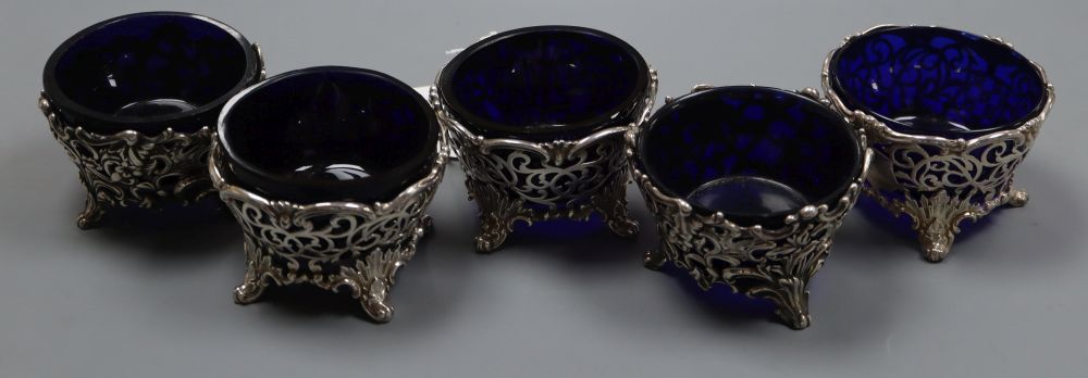 A set of three early Victorian pierced silver salts by The Barnards, London,1840 and a pair, London 1843.